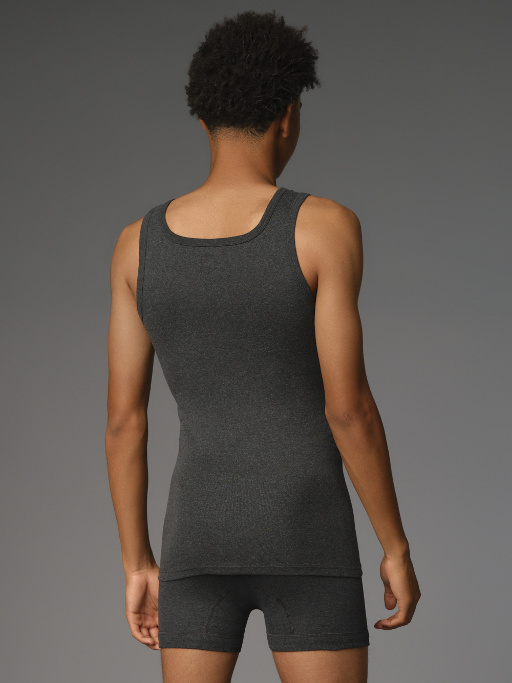 Undershirt by Comazo Protect in dark gray melange color. Back view: Man wearing Undershirt by Comazo Protect in dark gray melange color.