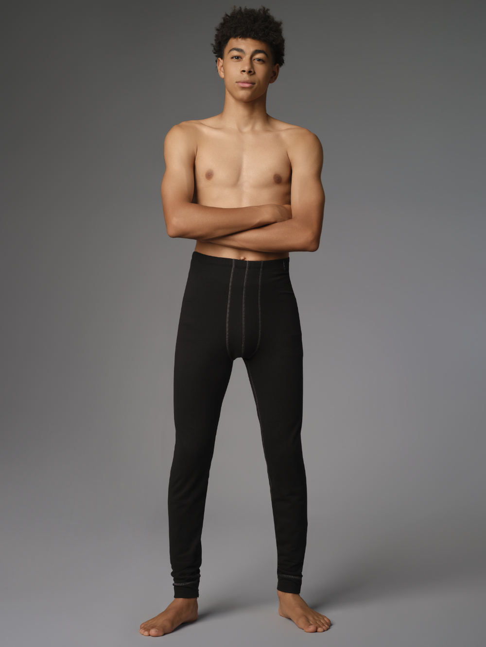 Comazo Protect men's functional pants "warm & clima" in black Front view: Man wearing Comazo Protect men's functional pants "warm & clima" in black
