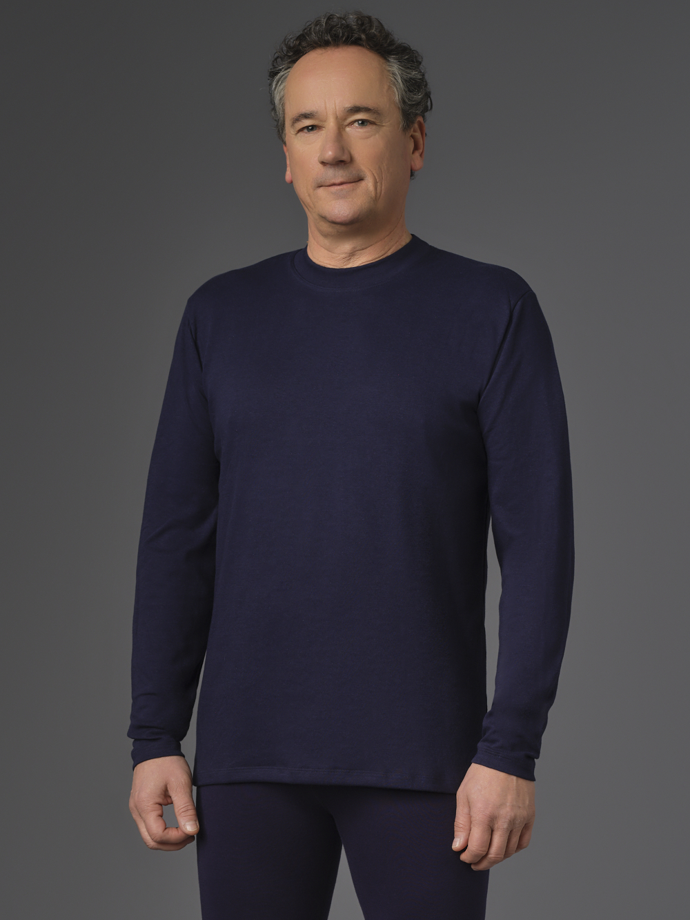 Long-sleeve shirt made from two-layer material by Comazo Protect in navy color. Front view: Man wearing Long-sleeve shirt made from two-layer material by Comazo Protect in navy color.
