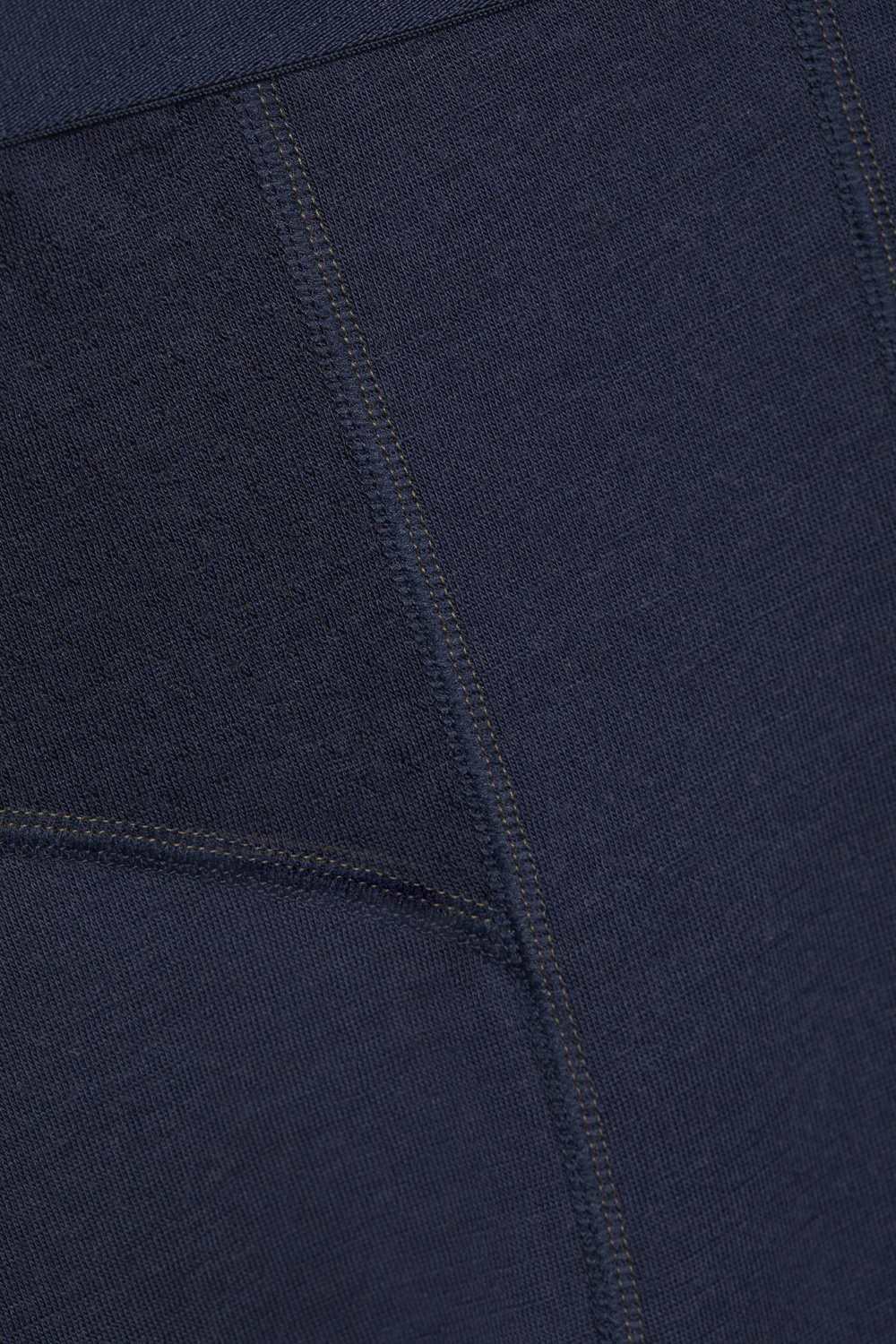 Comazo men's long underpants made of merino wool, color navy. Detail image: Long underpants made of 100% mulesing-free merino wool by Comazo in navy color with Comazo logo waistband.