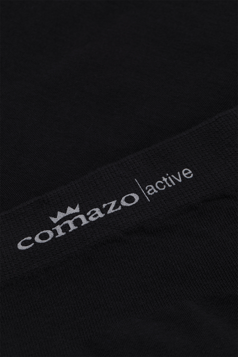Comazo men's seamless trunk in black color. Detail image: seamless trunks by Comazo in the color black.