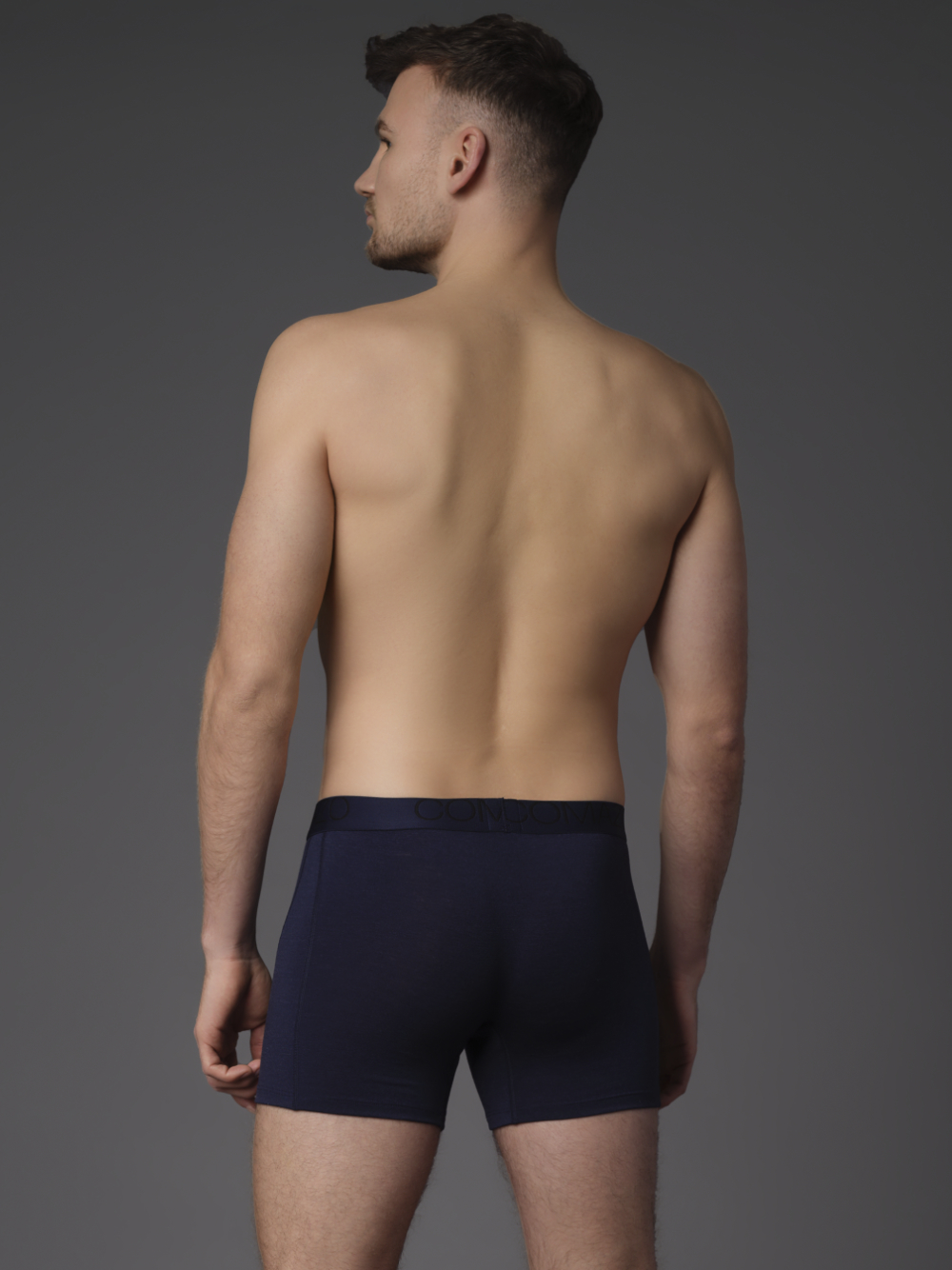 Durable Merino Wool Trunks by Comazo Protect in Navy Back View: Man wearing Durable Merino Wool Trunks by Comazo Protect in Navy