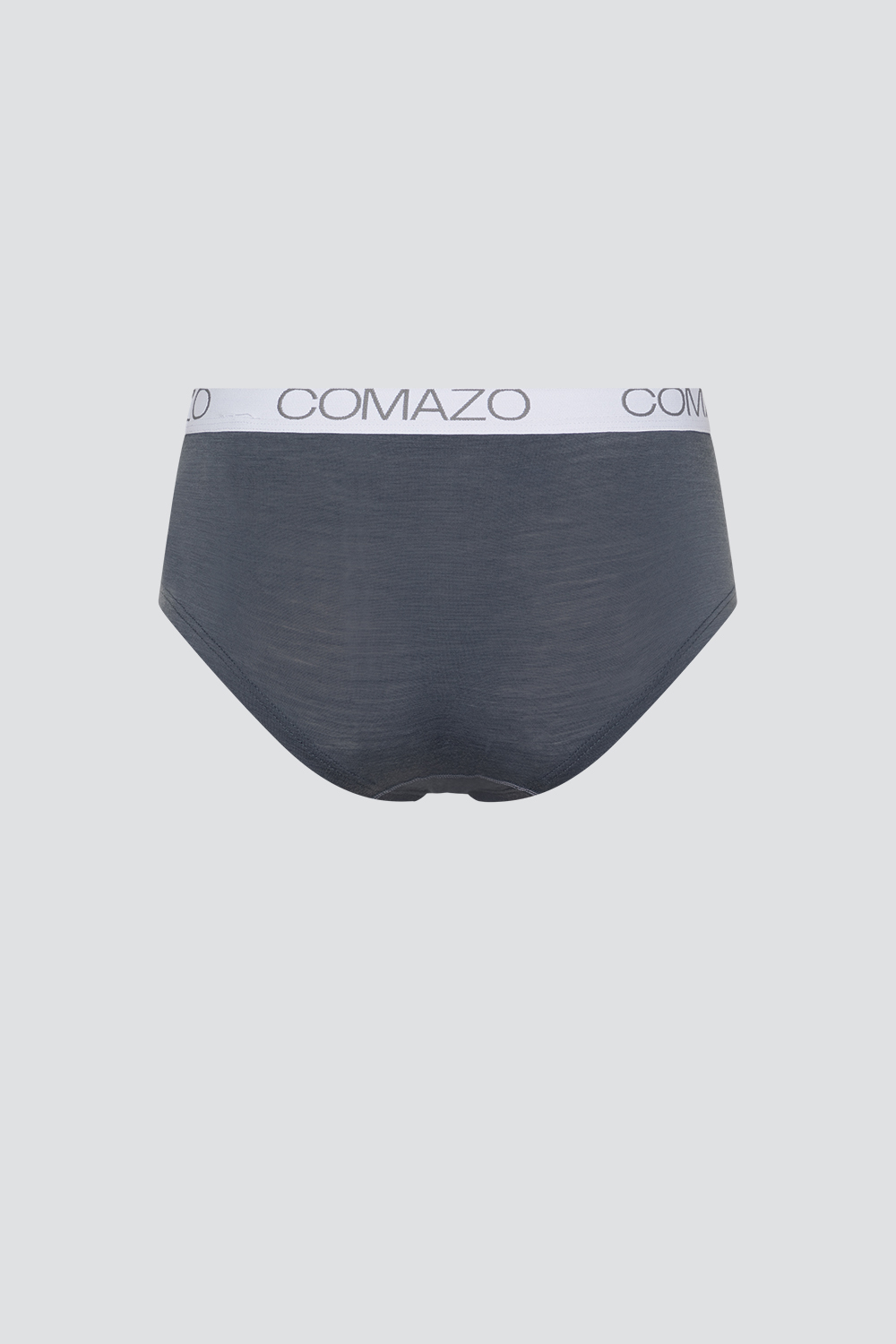 Nahaufnahme Rückansicht: Frau trägt Panty aus mulesing-free Merinowolle von Comazo in der Farbe Dunkelgrau