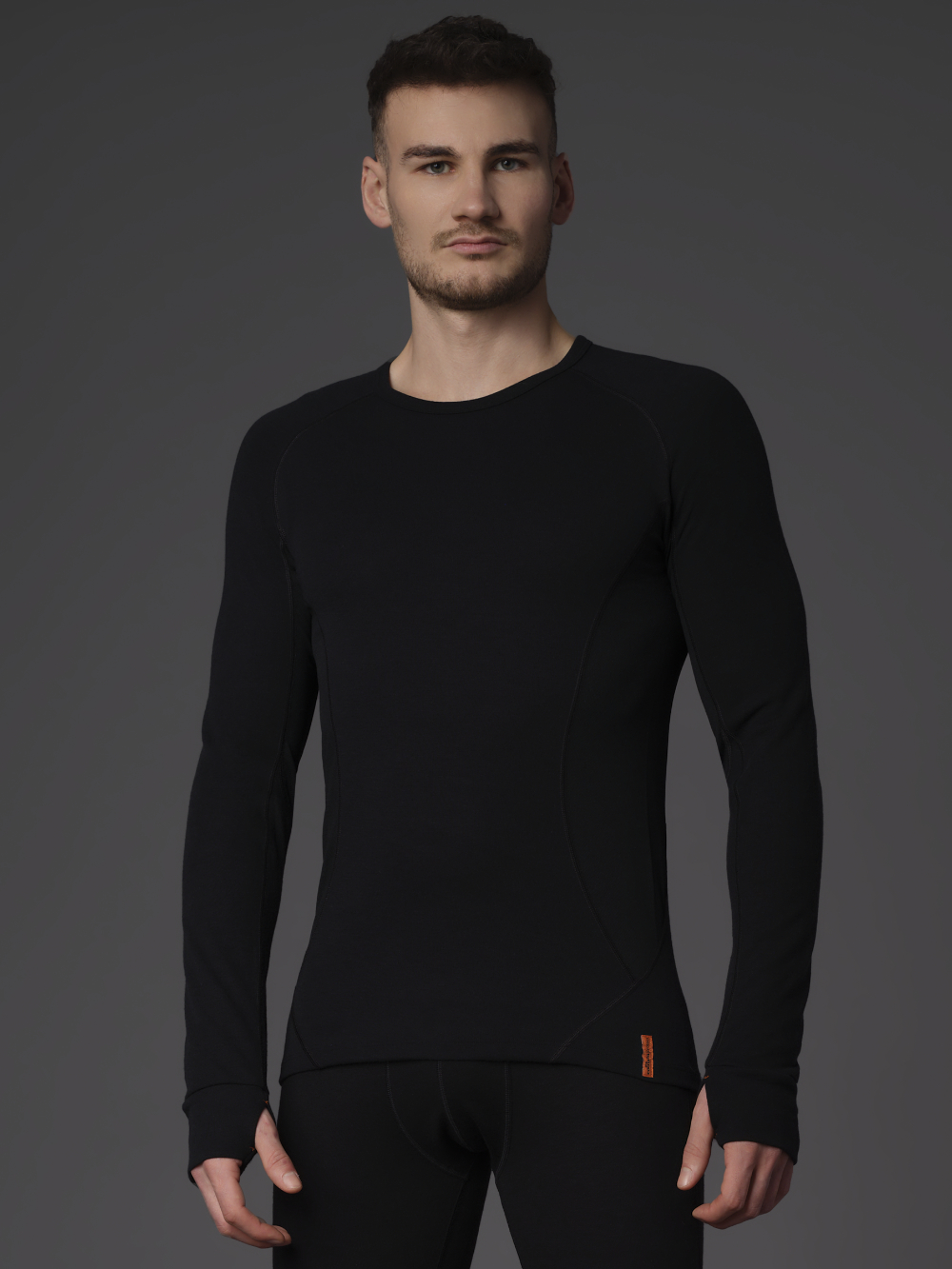 Functional shirt with mulesing-free merino wool by Comazo Protect, color black Front view: Man wearing Functional shirt with mulesing-free merino wool by Comazo Protect, color black