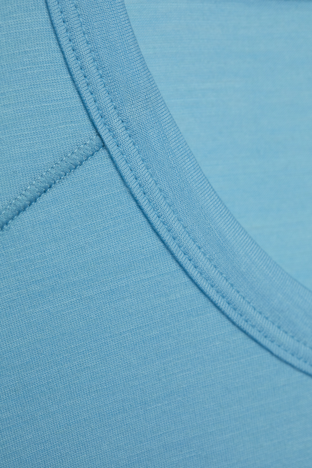 Comazo Herren Shirt kurzarm aus Merinowolle Farbe Seablue/Ice Detailbild Shirt kurzarm aus Merinowolle von Comazo in der Farbe Seablue/Ice mit längerem Rückenteil und Rundhalsausschnitt