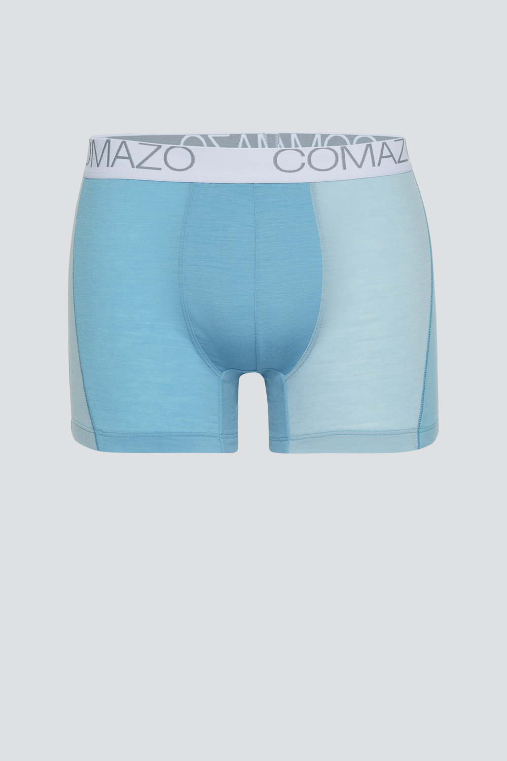 Comazo men's trunks made of merino wool in the color Seablue/Ice. Product image front view of the merino wool trunks from Comazo in the color Seablue/Ice with lettering on the waistband.