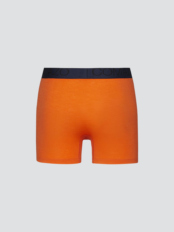 Comazo men's trunks made of merino wool in the color Orange/Crimson. Product image back view of Comazo men's trunks made of merino wool in the color Orange/Crimson.