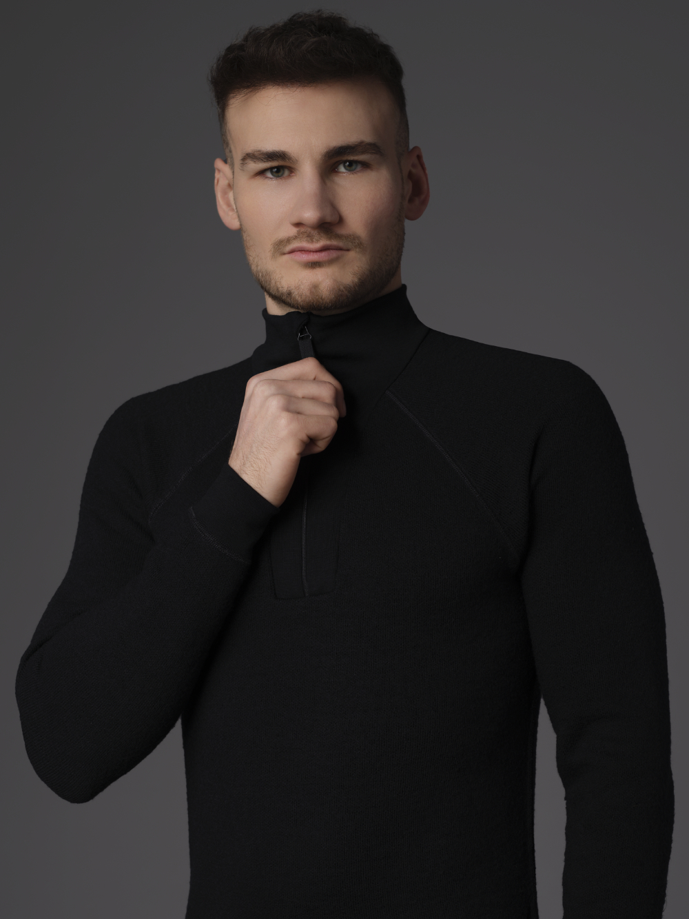 High-Quality Merino Wool Shirt with Zip Collar (Mulesing Free) by Comazo Protect in Black Close-up Front View 2: Man wearing High-Quality Merino Wool Shirt with Zip Collar (Mulesing Free) by Comazo Protect in Black