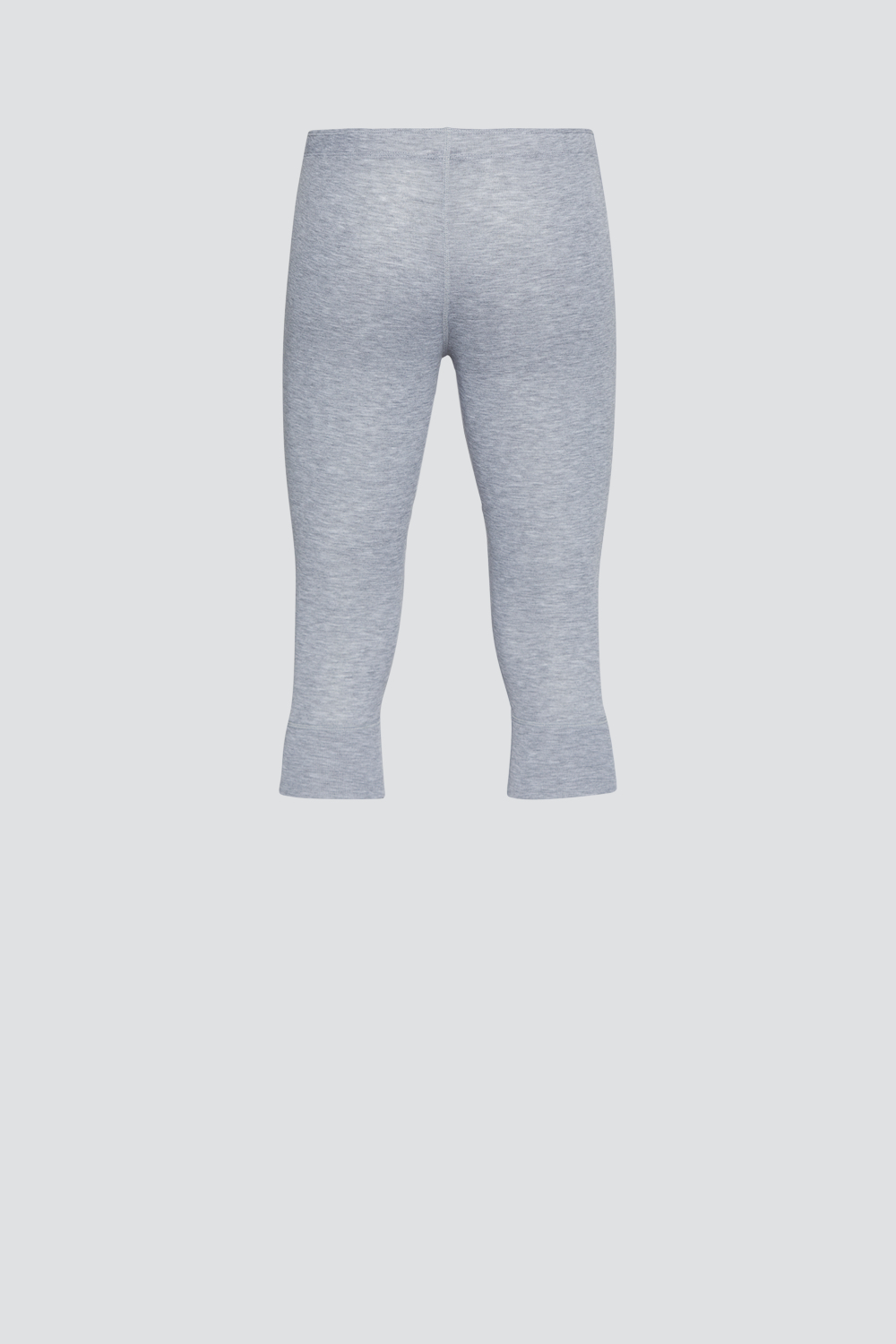Comazo unisex 3/4 functional pants "warm extra", color gray melange. Product image rear view Unisex 3/4 functional pants "warm extra" by Comazo in gray melange, with a brushed inner lining for optimal heat retention and quick-drying functional fabric thanks to excellent moisture management.