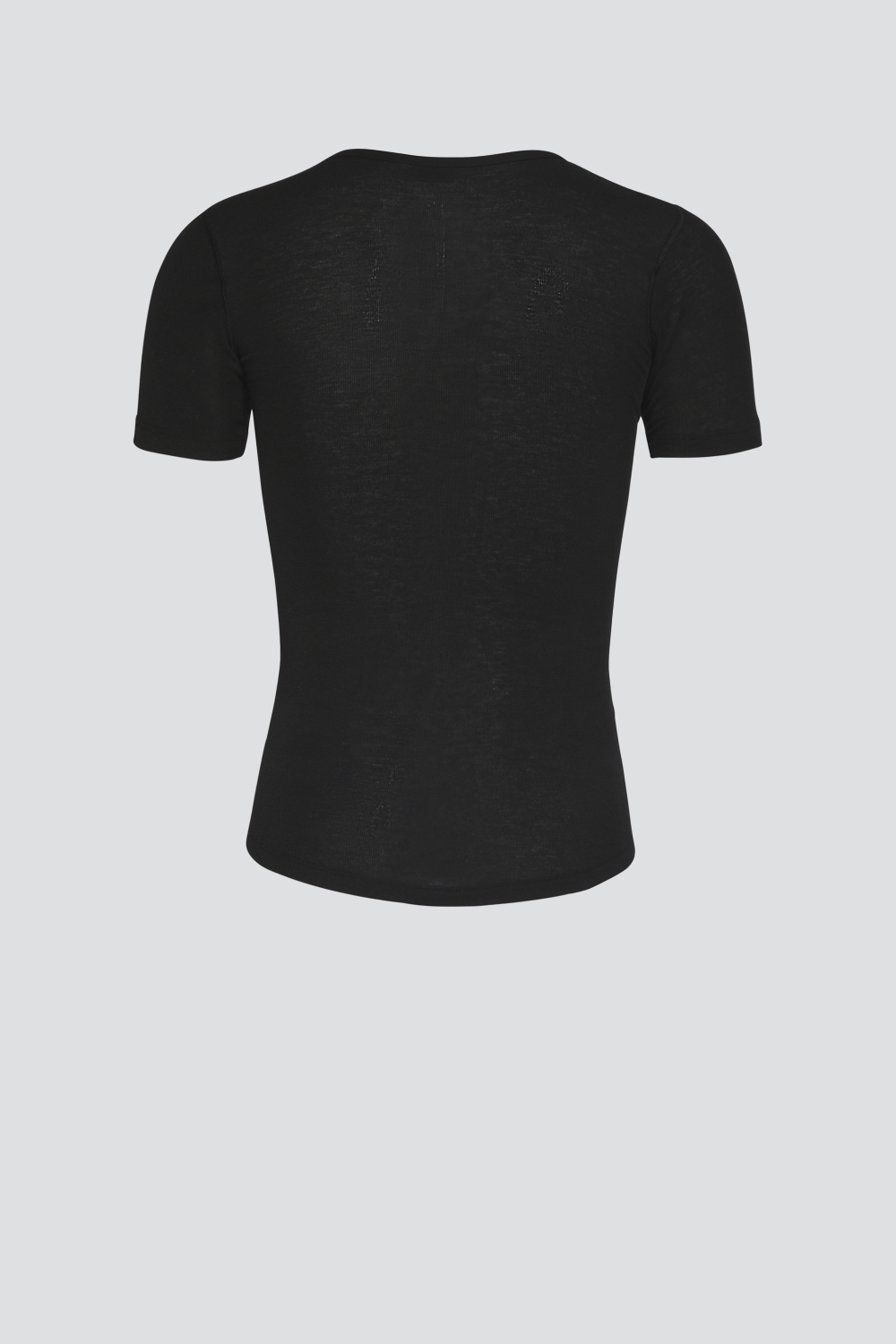 Comazo unisex short-sleeve functional shirt "warm extra", color black. Product image rear view Unisex short-sleeve functional shirt "warm extra" by Comazo in black, with a brushed inner lining for optimal heat retention, moisture management, and an extended back panel.