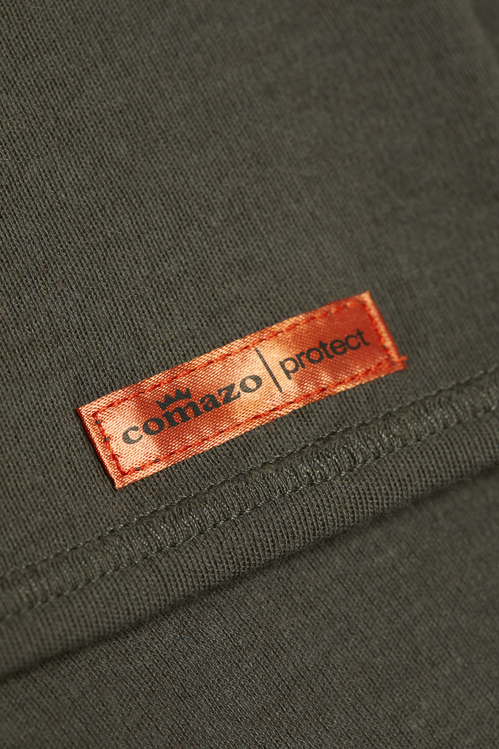 Flame-retardant tubular scarf by Comazo Protect in stone gray-olive color. Detail image of flame-retardant tubular scarf by Comazo Protect in stone gray-olive color.