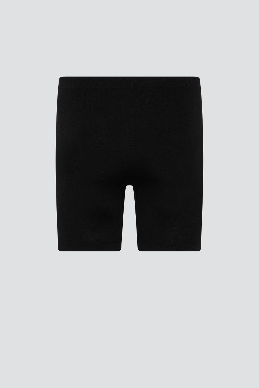 Comazo men's seamless pants with longer leg in the color black. Product image rear view of seamless pants with longer leg by Comazo in the color black.