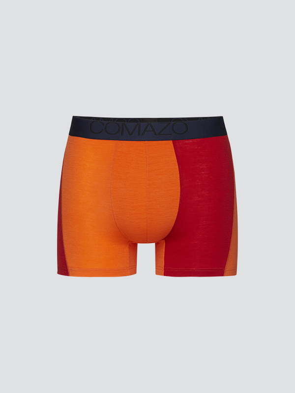 Comazo men's trunks made of merino wool in the color Orange/Crimson. Product image front view of Comazo men's trunks made of merino wool in the color Orange/Crimson.