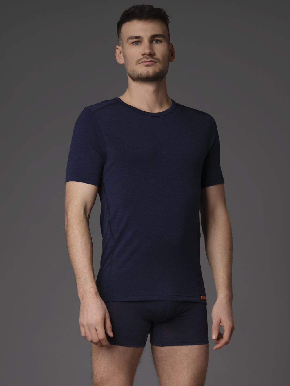 Comazo protect Durable Merino Wool Short Sleeve Shirt in Navy Front View: Man wearing Durable Merino Wool Short Sleeve Shirt by Comazo Protect in Navy