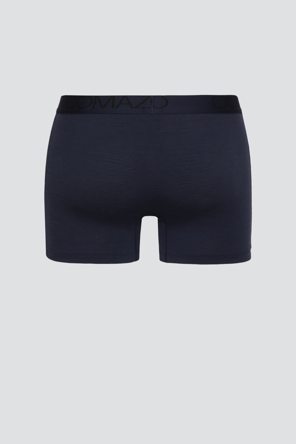 Comazo men's trunks made of merino wool in the color Navy/Chocolate. Product image back view of Comazo men's trunks made of merino wool in the color Navy/Chocolate.