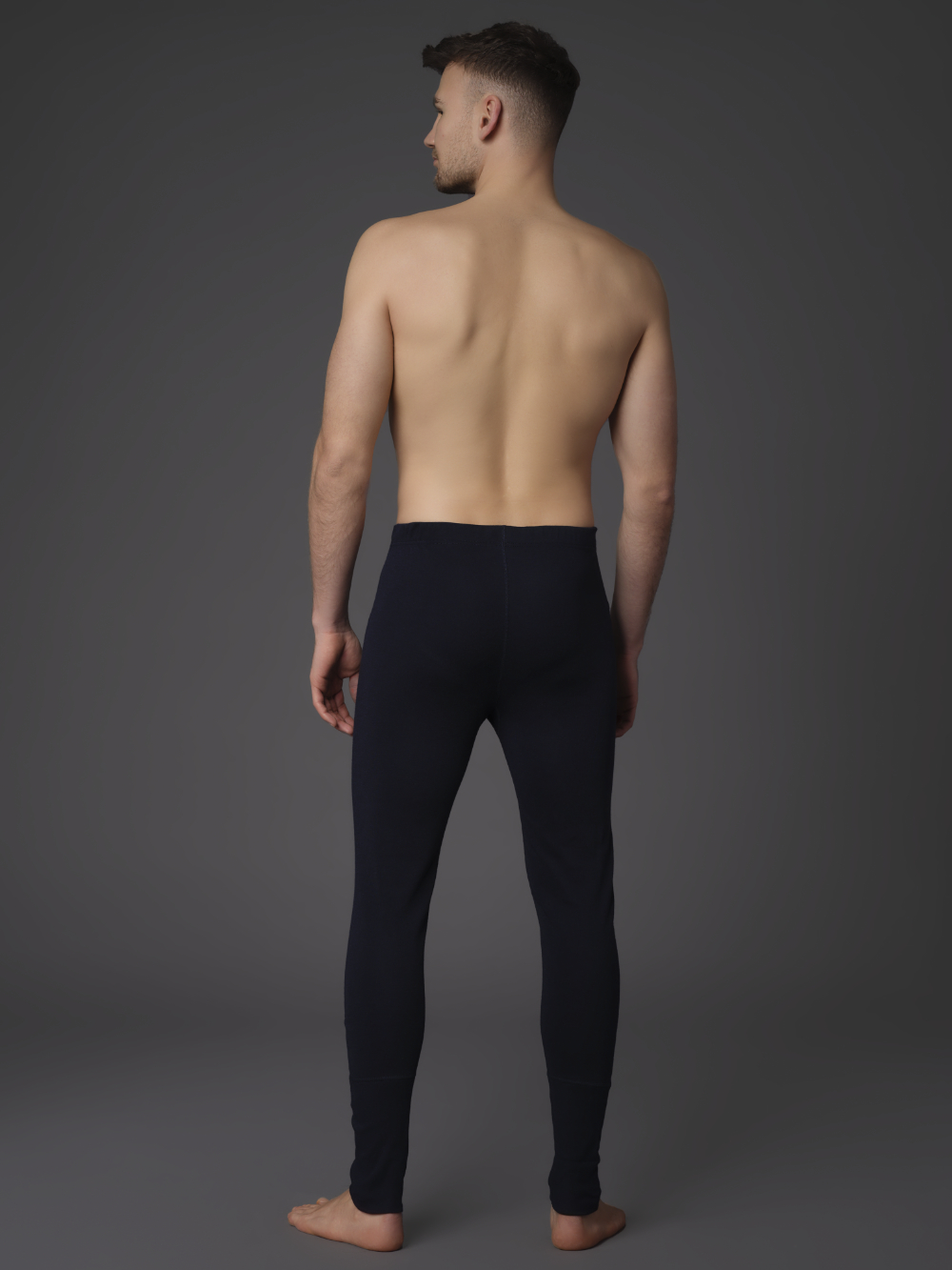 Long flame-resistant underwear from Comazo Protect in the color Navy. Back view: Man wearing long flame-resistant underwear from Comazo Protect in the color Navy.