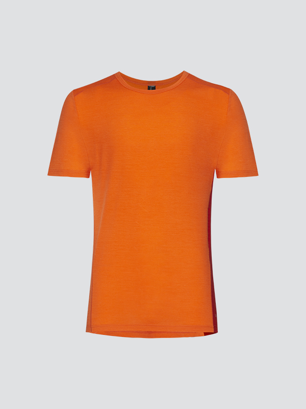 Comazo men's short-sleeve shirt made of merino wool, color orange/granite. Product image front view: Short-sleeve shirt made of merino wool by Comazo in orange/granite color with extended back panel and crew neck.